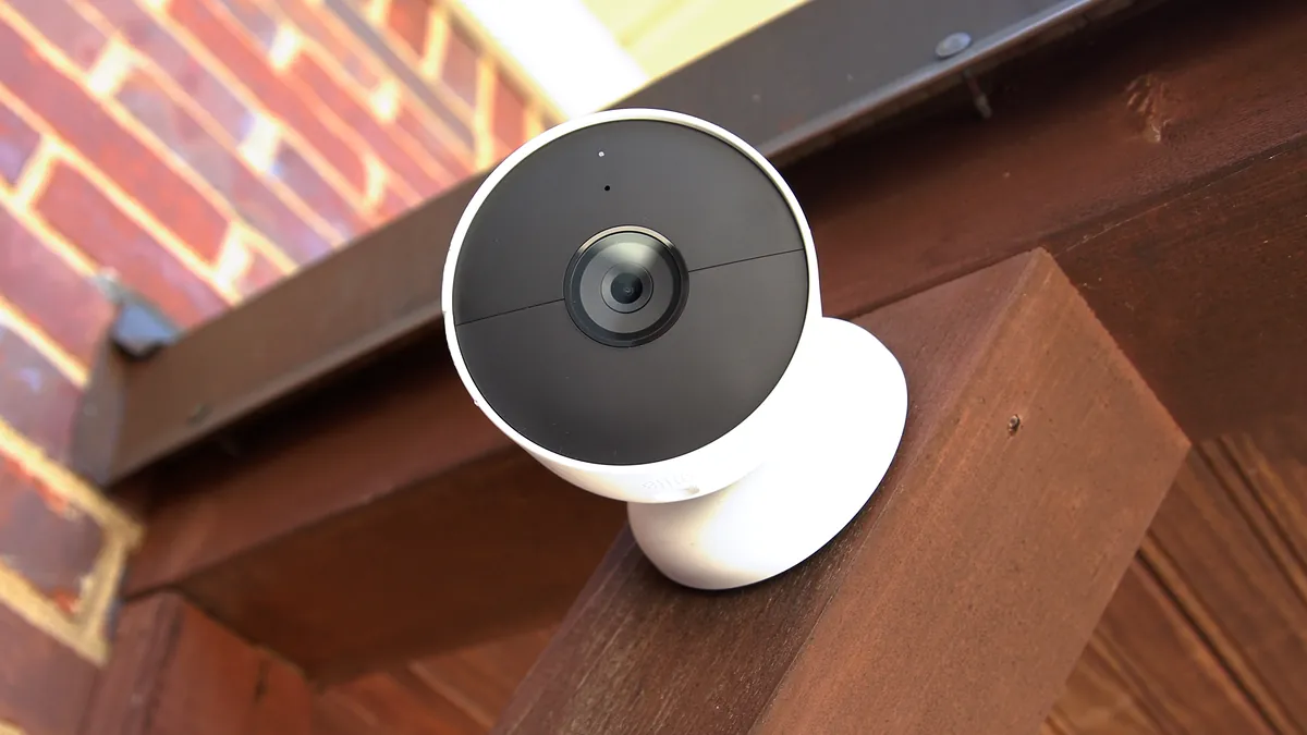 Outdoor bullet camera on perimeter fence — IP66 housing at 4m mounting height